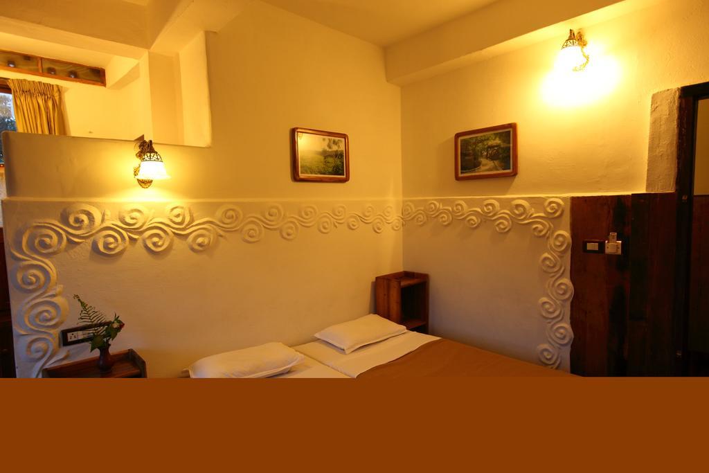 Coffee Inn Kumily Quarto foto
