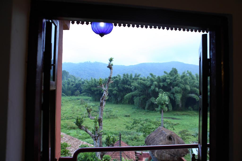 Coffee Inn Kumily Quarto foto